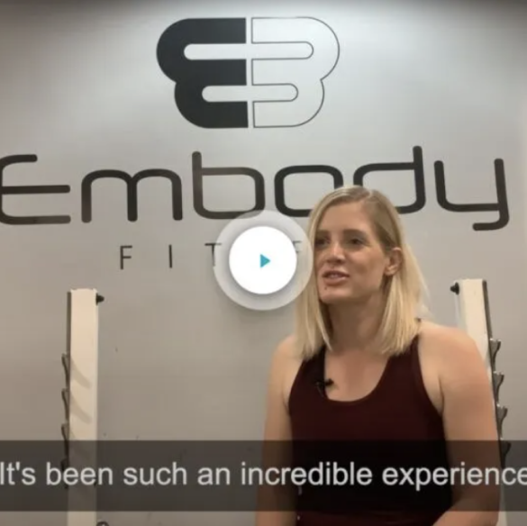 a woman sharing her experiences towards training with embody fitness