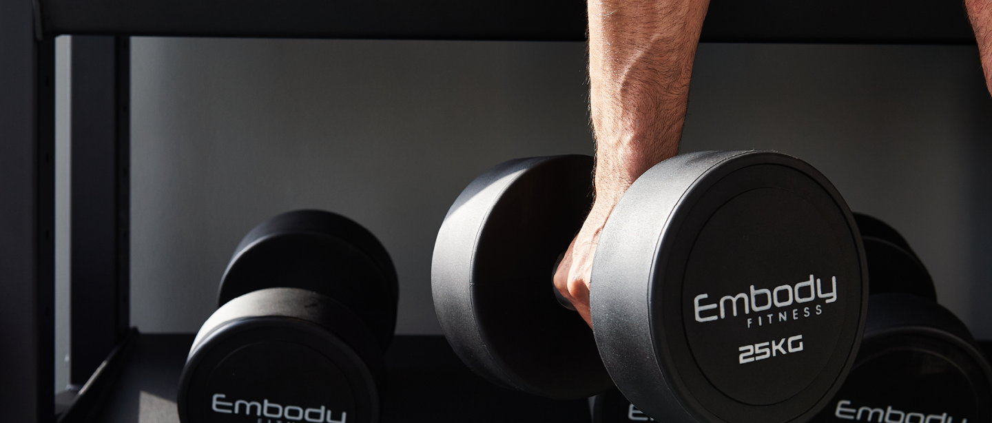 an embody fitness dumbbell is being lifted