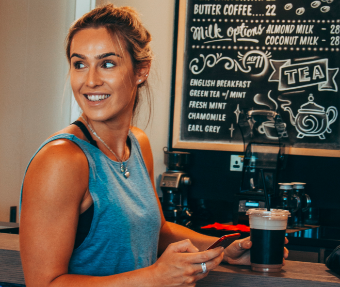 woman holding coffee