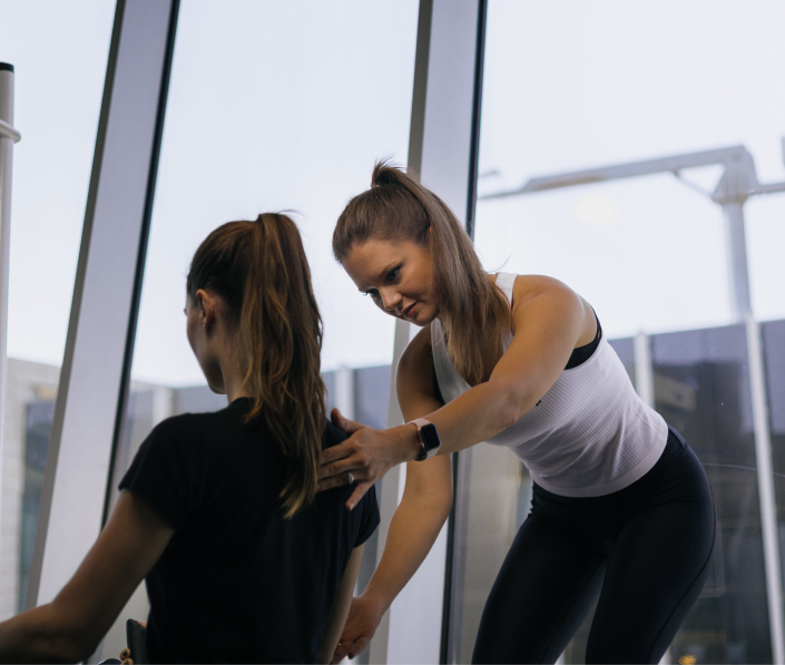 two women training at gym