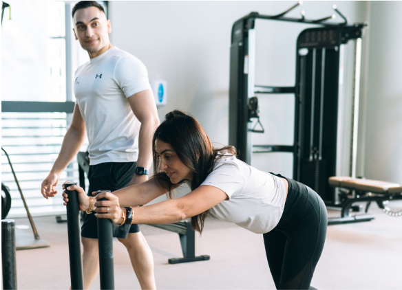trainee pushing with trainer